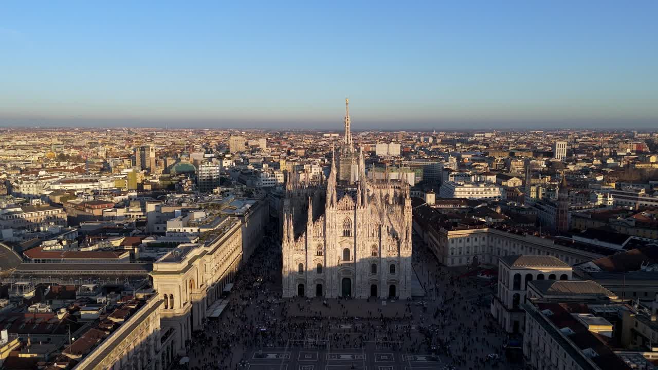 Aerial view of Milan duomo cathedral with cityscape during clear sky sunset