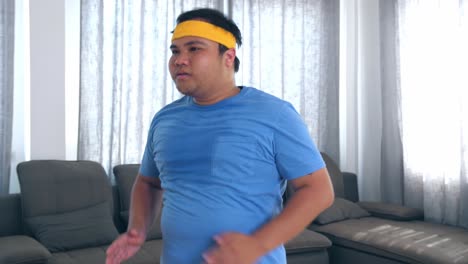 overweight man exercising at home