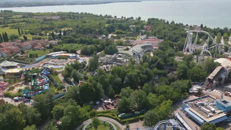 panoramic aerial overview of incredible gardaland roller coaster theme park, summer day