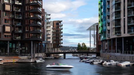 oslo modern buildings canal yachts boats