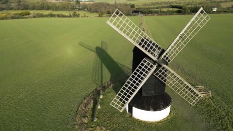 pitstone windmill aerial view casting sunrise shadow over english national trust buckinghamshire agricultural countryside