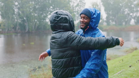 Camping,-love-and-an-interracial-couple-hugging