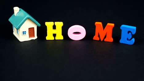 colorful letters isolated on black : home