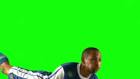 football player heading the ball