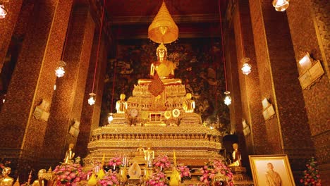 buddha statue surrounded by ornate decorations