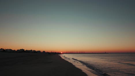 Walk-towards-the-sunrise-on-the-beach,-La-Grande---Motte,-Montpellier---France