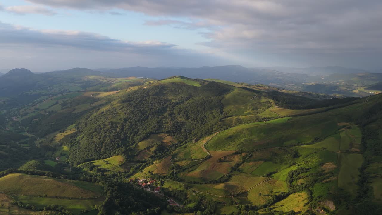 Aerial view of lush green hills in cantabria, spain