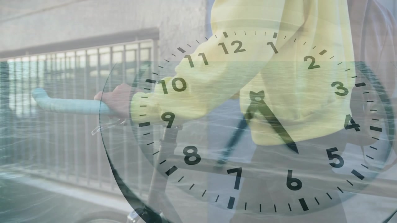 Double Exposure of Person Cycling and Clock Face