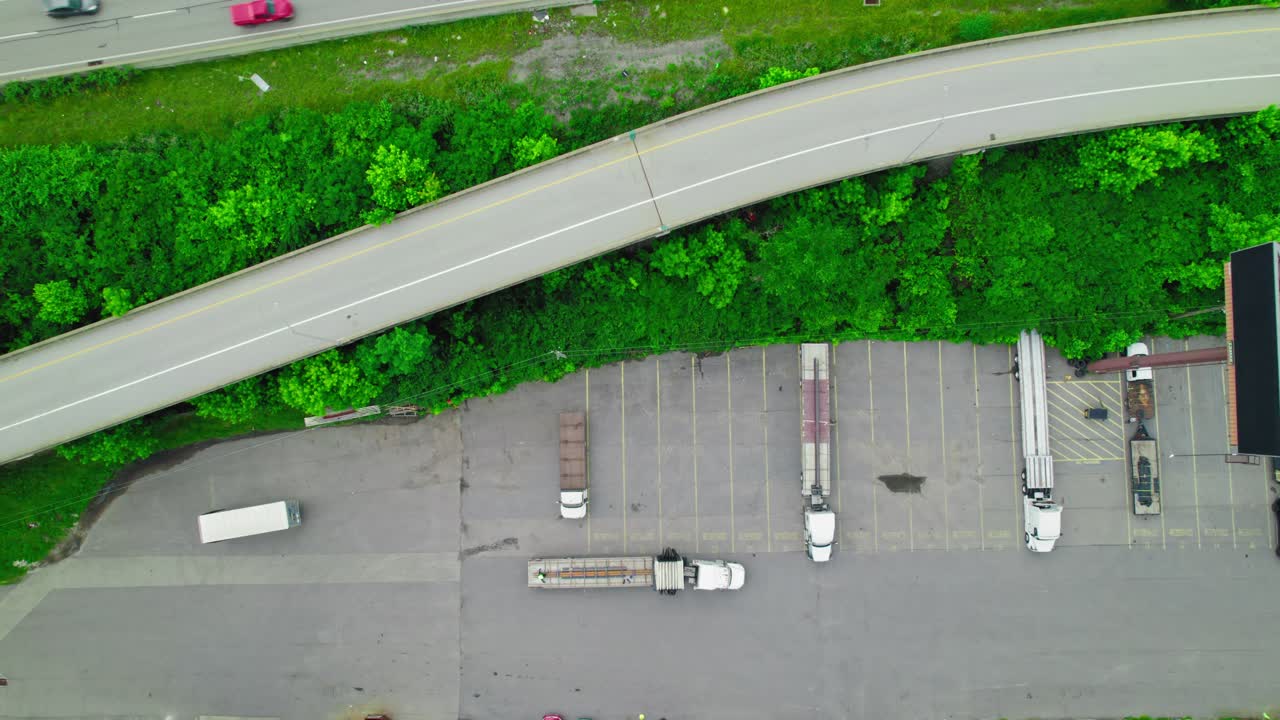 Top down flatbed, stepdeck and conestoga trailer at shipping department in Pittsburgh Pennsylvania, America.