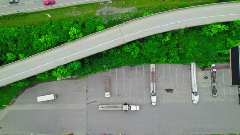 top down flatbed, stepdeck and conestoga trailer at shipping department in pittsburgh pennsylvania, america.