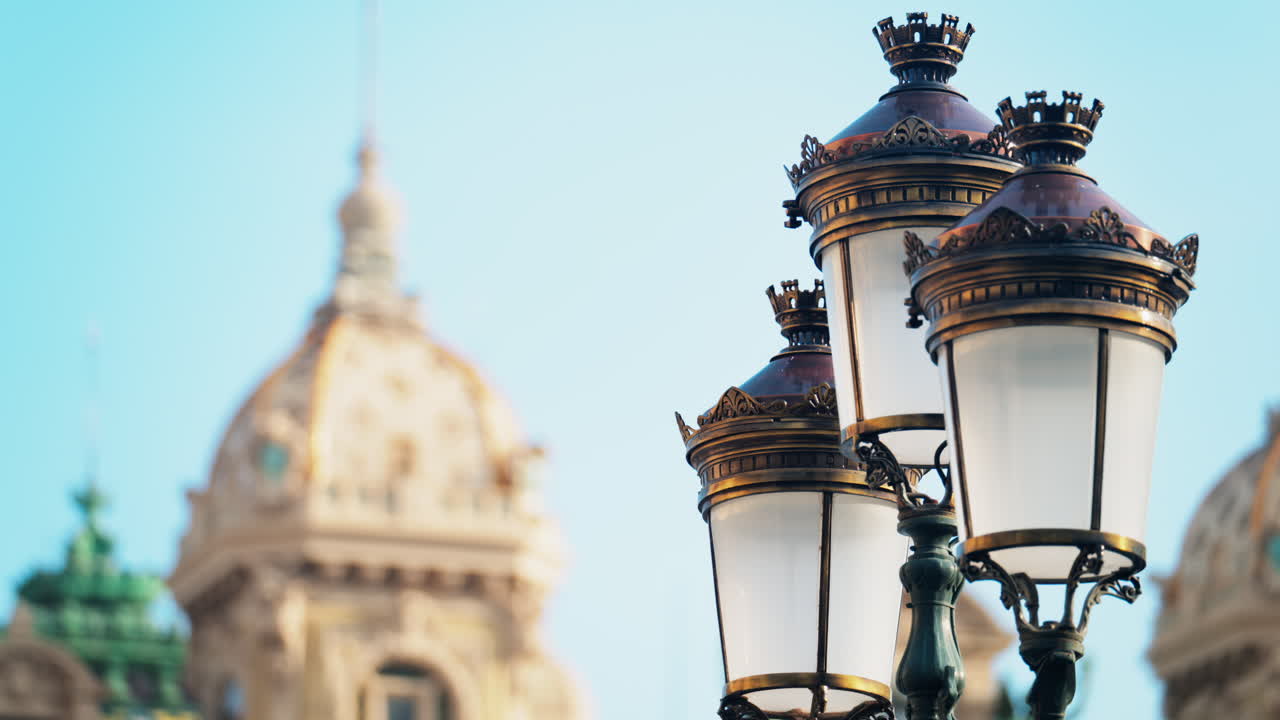 Lamp in front of the Monte Carlo Casino on the blurred background