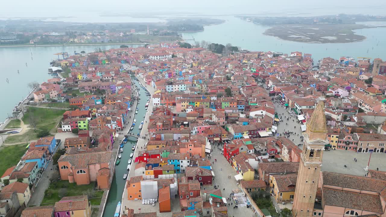 Wide Aerial Flyover of The Island Of Burano, An Island Province Of Venice In Italy On A Foggy Day.