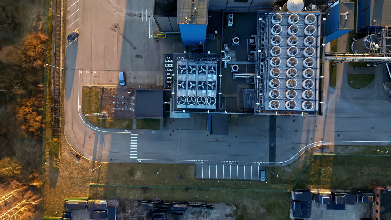 Overhead shot of an HVAC cooling system on top of a corporate processing facility