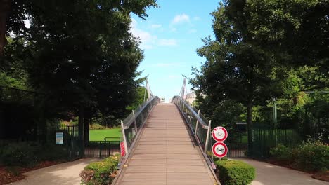 bottom up panning of a bridge at the coulée verte in paris 12th disctrict