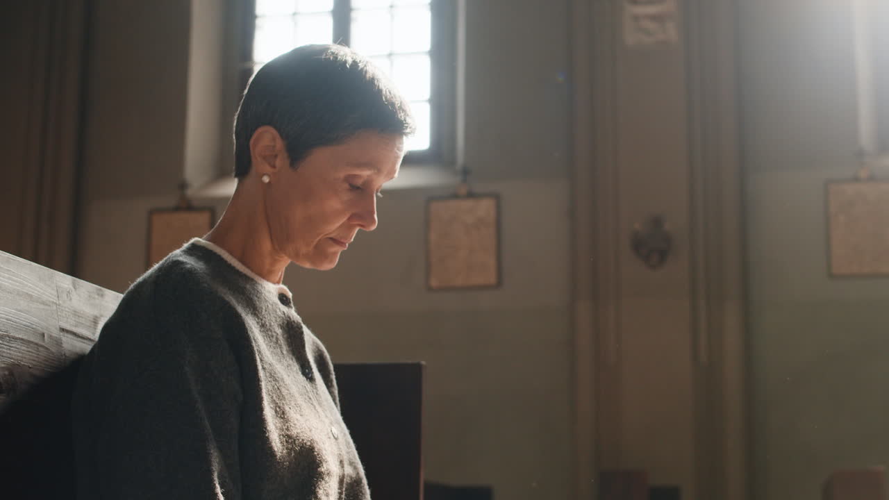 Woman in Prayer at Church