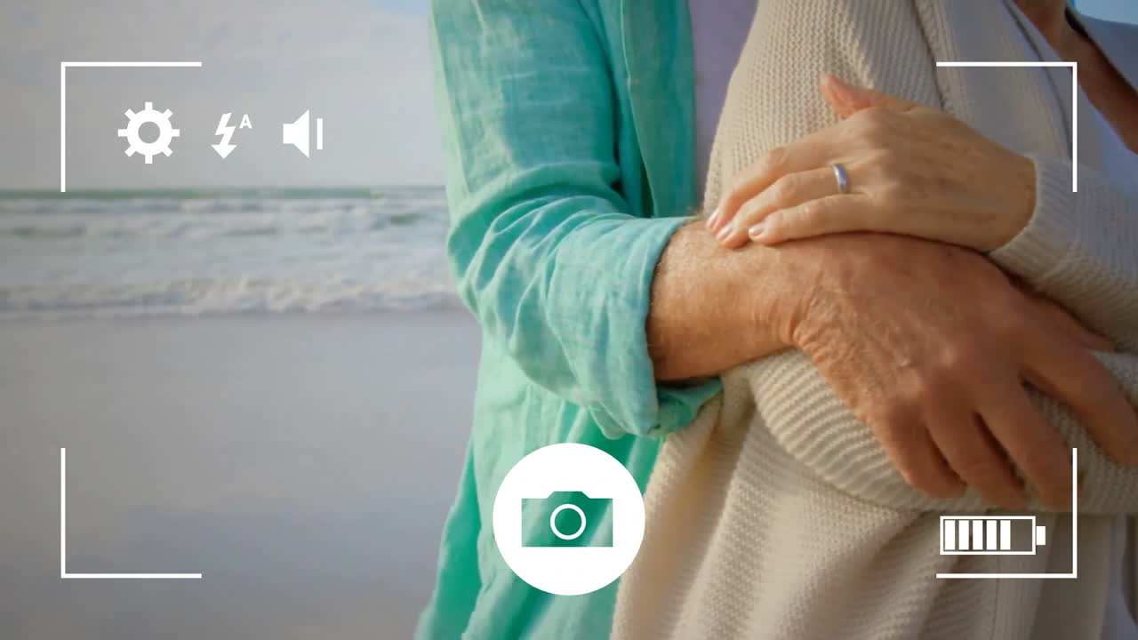 tomando fotos de una pareja con una cámara digital