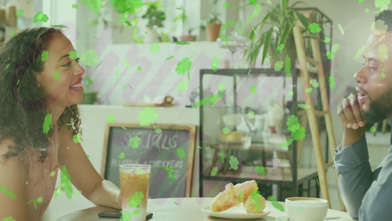 Woman sipping iced latte as camera panning, revealing man, green overlay, couple chatting in cafe