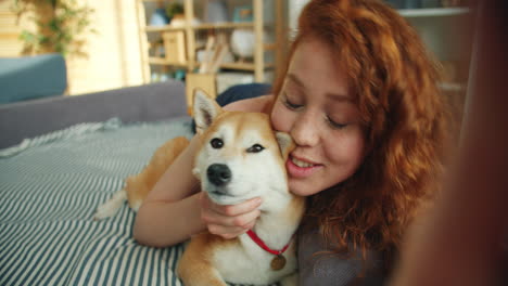 woman and dog selfie