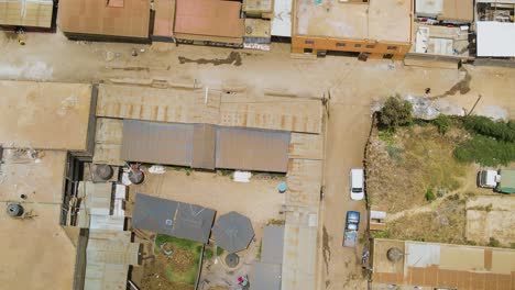 Vista-Aérea-De-Pájaro-De-Loitokitok-Kenia,-Barrio-Pobre-De-Chabolas-De-Los-Suburbios-De-Nairobi,-Kenia