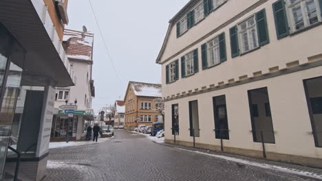 street with historical houses in metzingen, germany