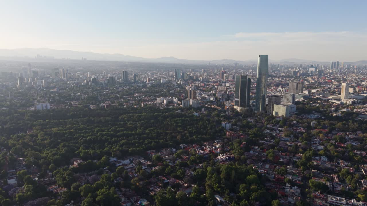 Aerial panorama of south of Mexico City during a smoggy day