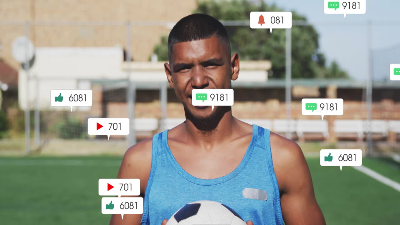 Man holding soccer ball on grassy pitch, showcasing floating social media marketing icons
