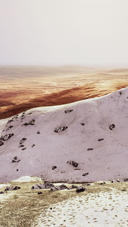 winter landscape: footprints in the snow on a mountaintop