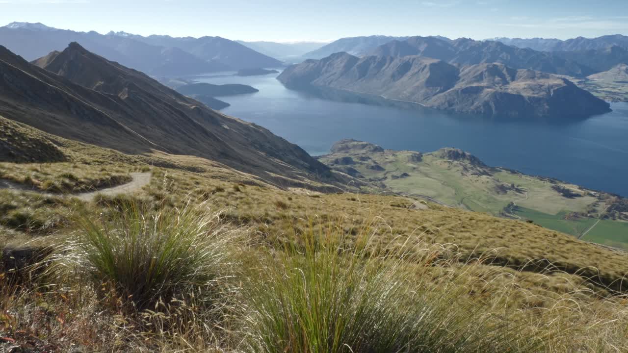 Scenic Landscape Of Lake Wanaka And Roys Peak In New Zealand - Wide Shot