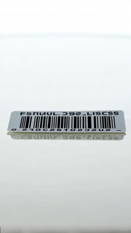 barcode label with reflection on white surface