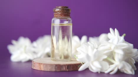 jasmine essential oil with flowers