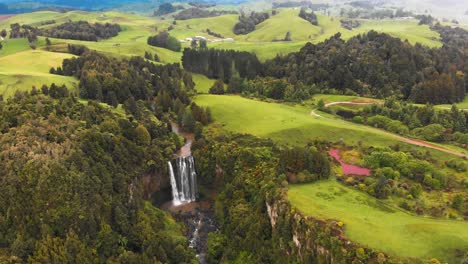 A-remote-unknown-waterfall-with-colorful-valleys-and-colorful-lakes-in-New-Zealand