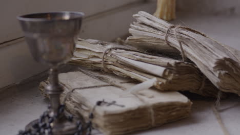 old ancient scholars study religious texts on weathered scrolls and documents - history and faith