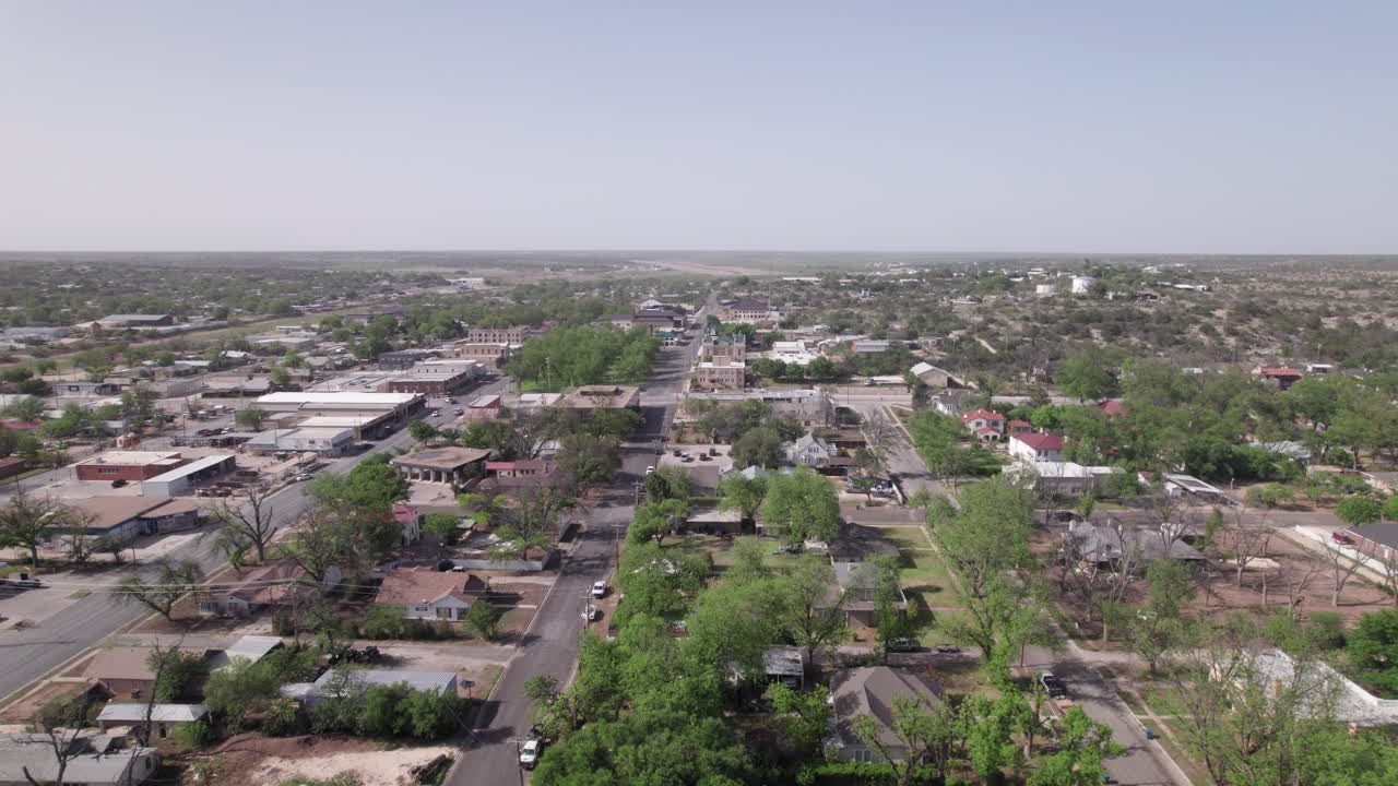Main Street Ozona, Texas and historic courthouse, aerial view of west Texas small town