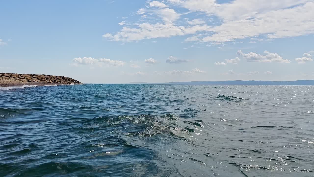 Woman swimming in a beautiful lake