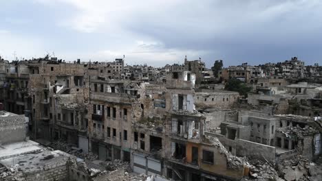 the historic city centre of aleppo in syria. we still can see buildings destroyed even 10 years after the war - aerial view 4k