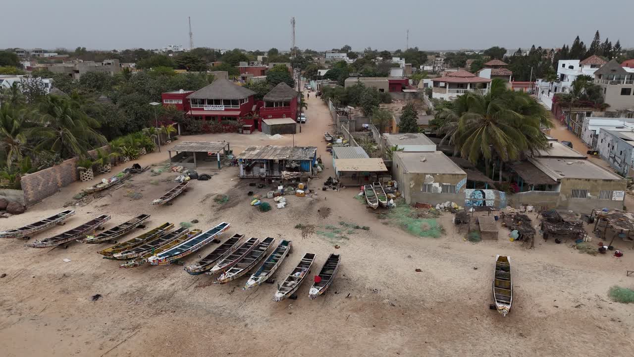 Aerial view of Somone sandy beach Senegal, fisherman boat near the Atlantic coast