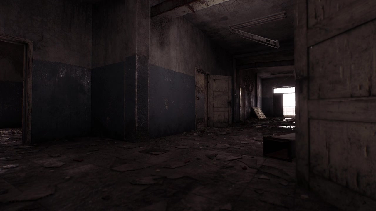 Interior de edificio abandonado con puertas desgastadas y escombros esparcidos.