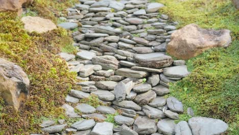 a beautiful path made of stones in the middle of the forest travel concept a beautiful path made of stones in the middle of the forest travel concept