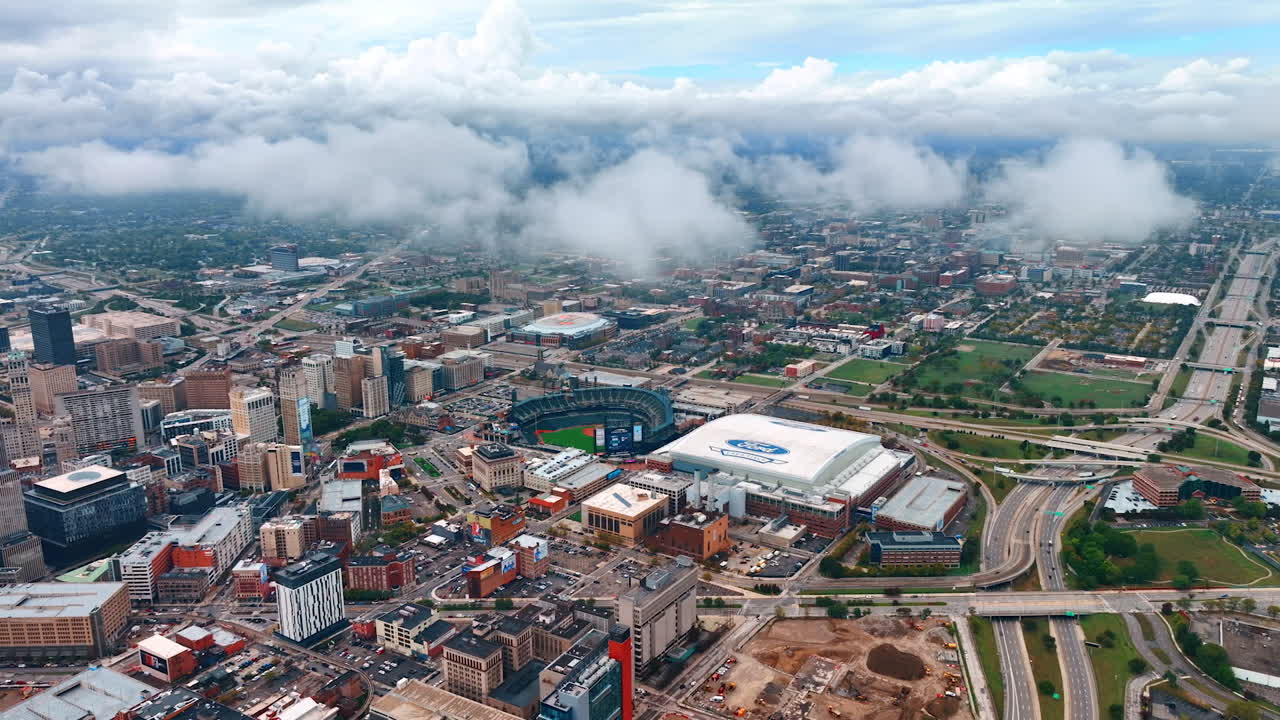 Detroit, USA, 28 July 2025: Aerial View of Detroit's Sports and Business Core Under Clouds. An elevated view captures the dense cluster of downtown Detroit sports venues