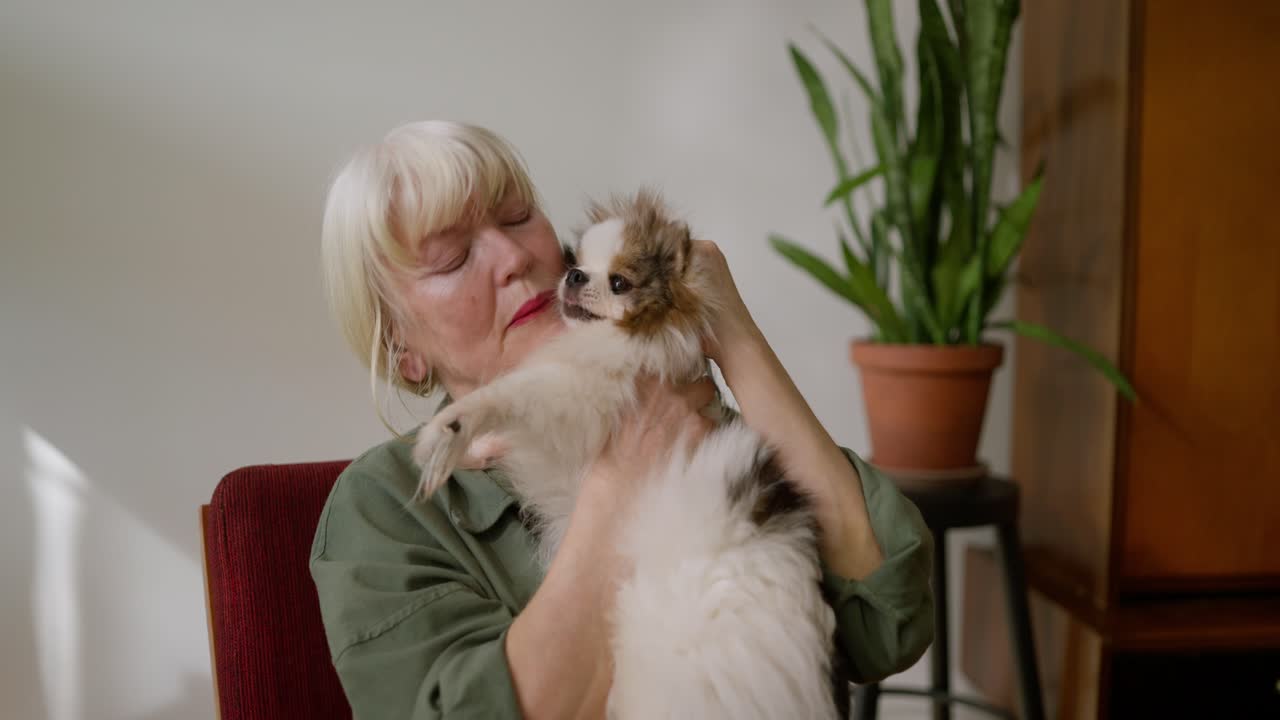 Woman Holding a Chihuahua