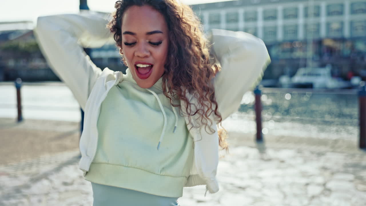 Woman, beach and exercise dancing with energy