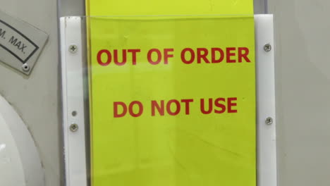 out of order, do not use sign on a machine