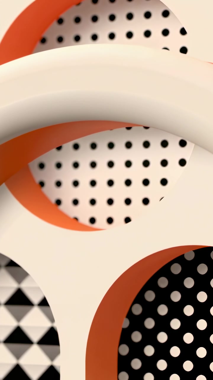 Video verticale: Tubo bianco che scorre attraverso il set mentre la telecamera panoramica, rivelando cerchi per mostrare motivi.