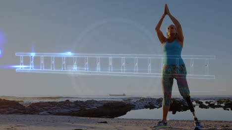 animation of dna strand over woman with artificial limb meditating by seaside