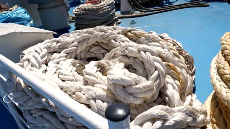 coiled rope lying on the ferry's deck