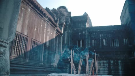 incense sticks burning at angkor wat temple in siem reap, cambodia