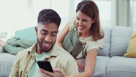 Phone,-comic-and-happy-couple-relax-on-a-sofa