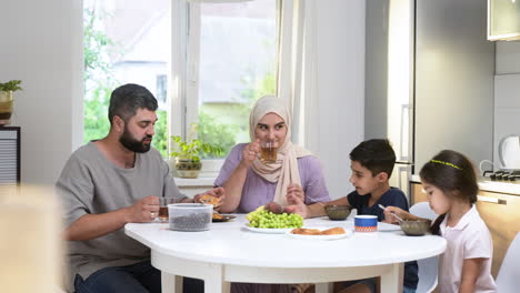 islamic family having breakfast.