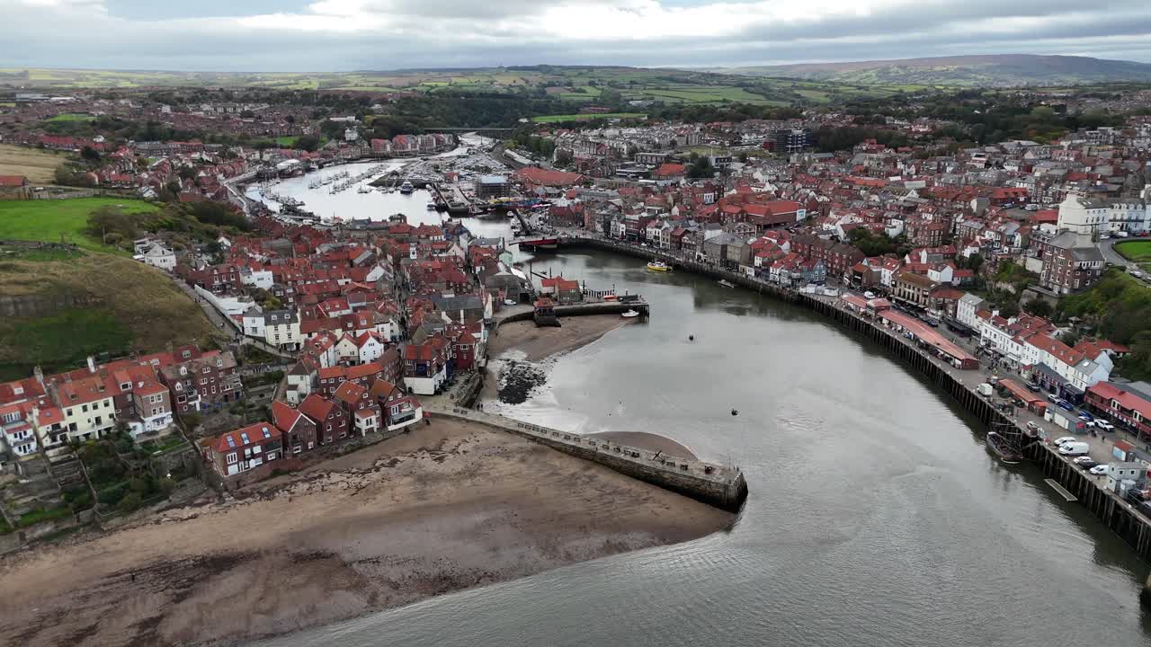 Aerial drone view Whitby Abbey north yorkshire british english seaside port harbour town city england uk