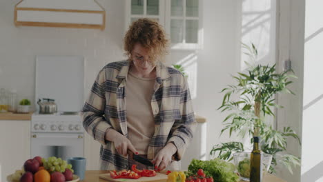 woman preparing a salad in a kitchen